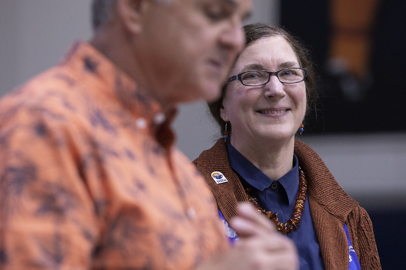 Katherine Powers smiles while being recognized for her service to the institution.