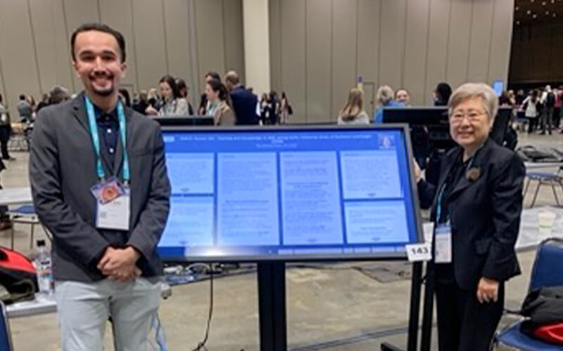 Alum Ryan Nadler, left, and HyeKyeung Seung, right, chair and professor of communication sciences and disorders