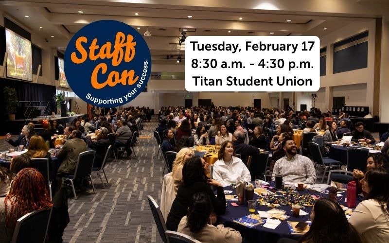 A busy conference in a large hall with attendees seated at circular tables, with event information displayed. Transcribed Text: Staff Con Supporting your success. Tuesday, February 17 8:30 a.m. - 4:30 p.m. Titan Student Union.