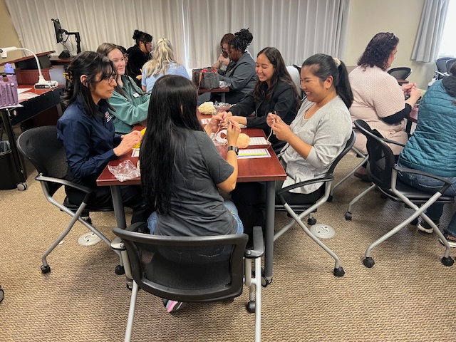 a group of people crocheting